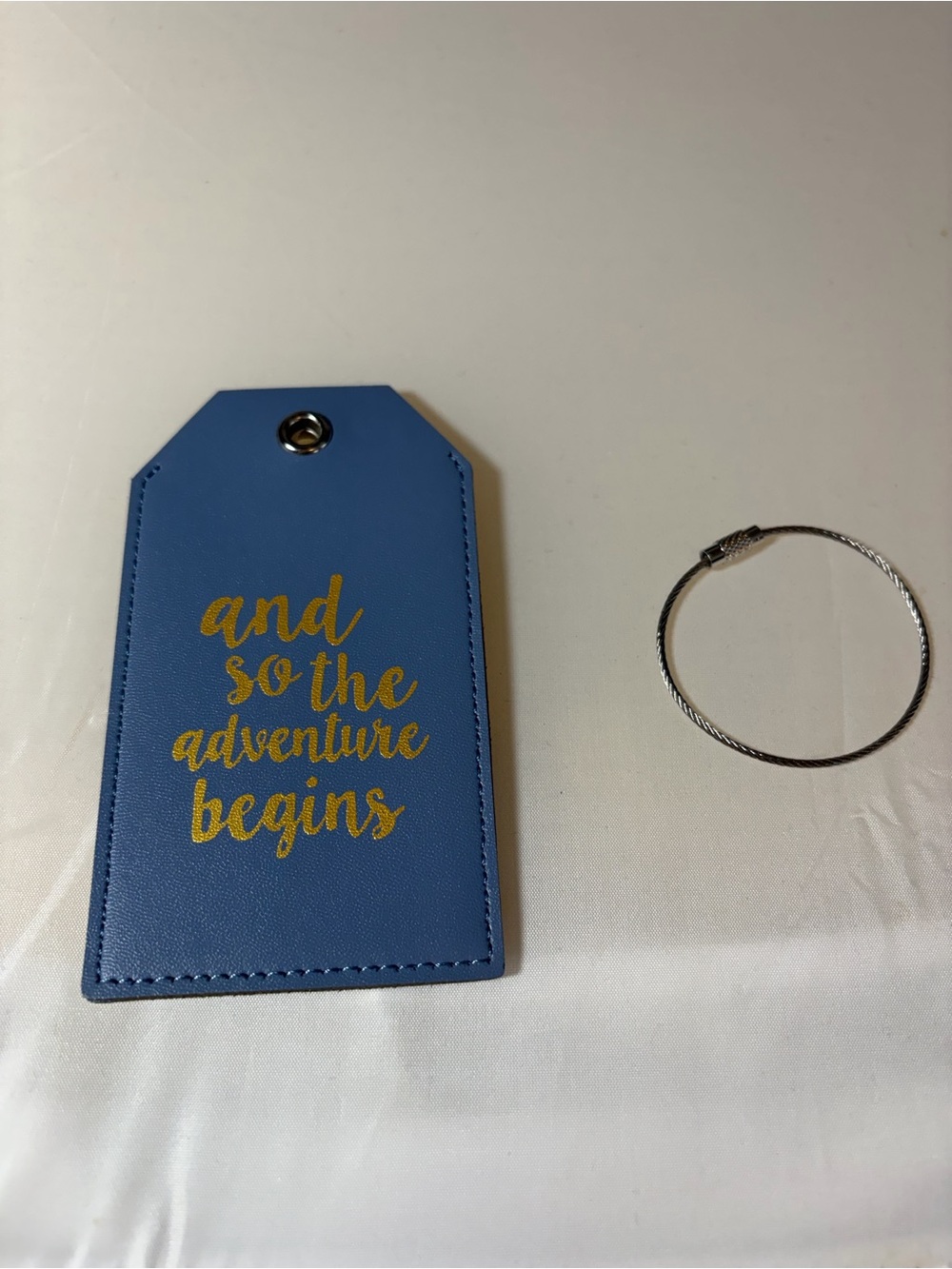 Casmonal 'And so Adventure‎ begins' faux leather luggage tag blue
